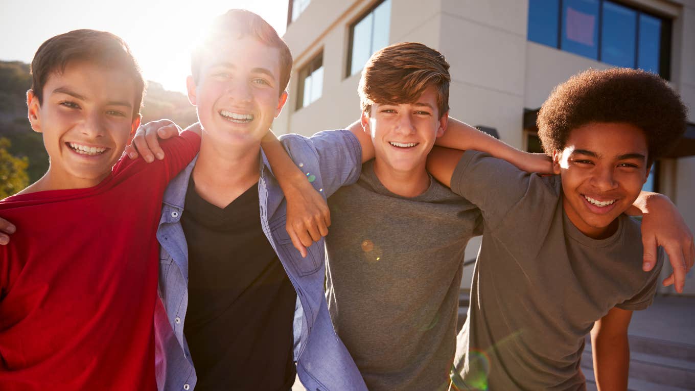 group of teen boys smiling