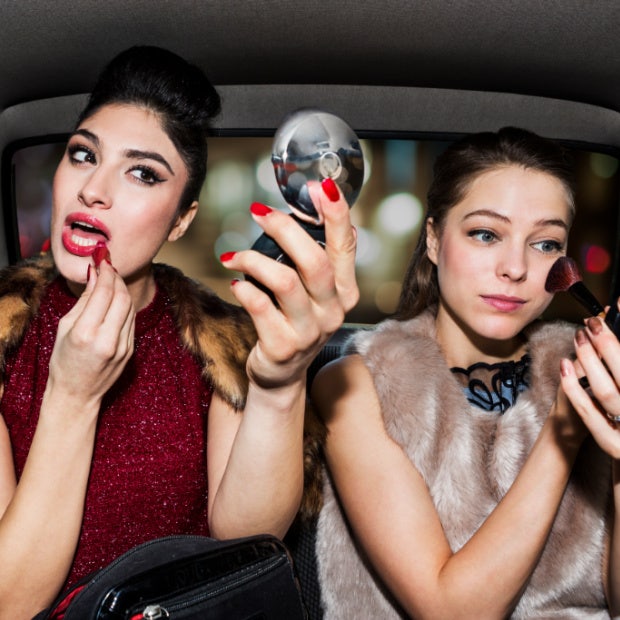 secrets women keep girls night out putting on makeup in the car