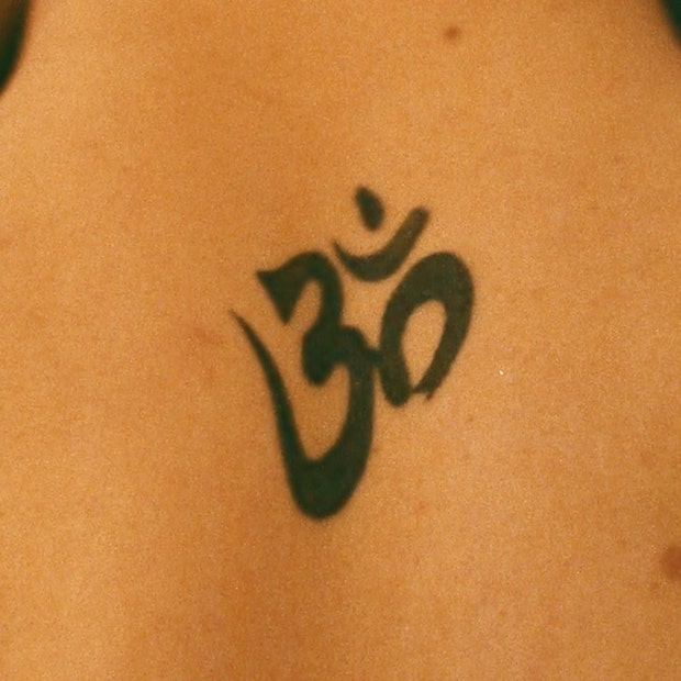 small tattoos with big meaning om