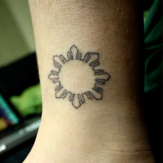 small tattoos with big meaning sun