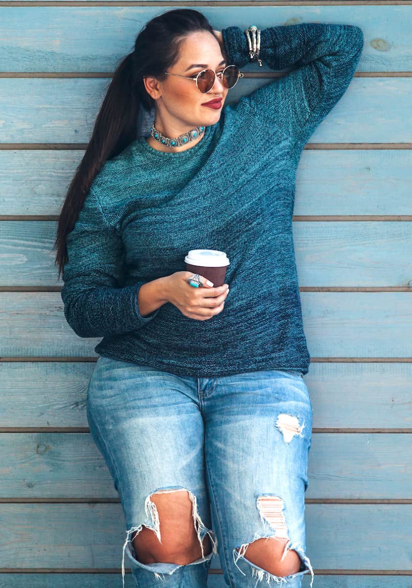 confident and relaxed woman with coffee