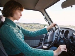 Girl driving in a car.