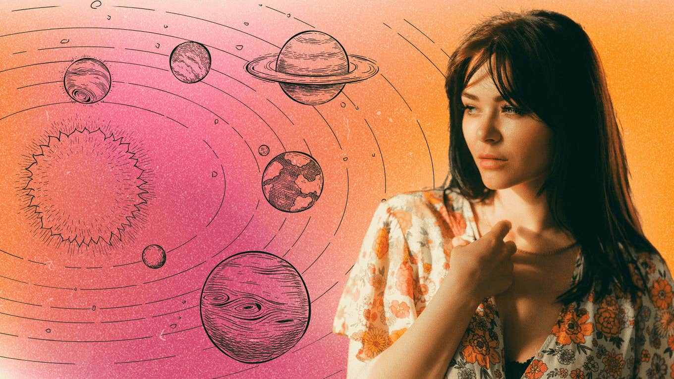 woman looking at planets involved in may 2024 astrology transits