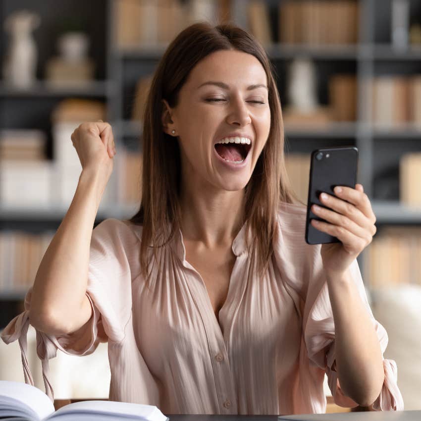 Woman happy about making money on social media