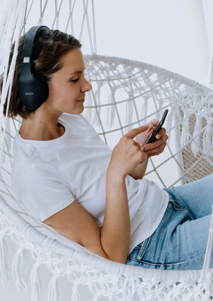 woman listening to music on phone
