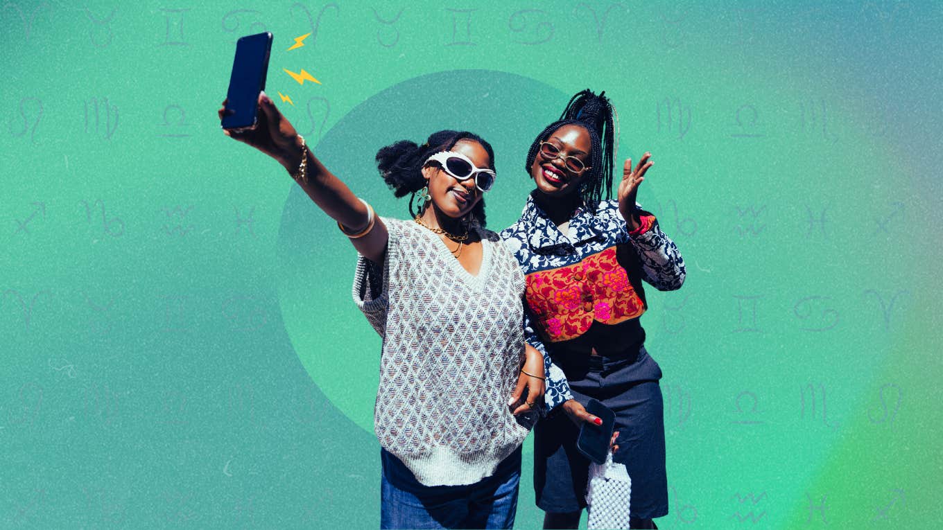 two women taking a selfie with zodiac signs experiencing abundance