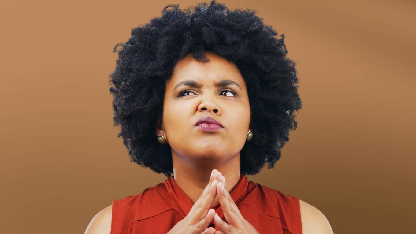 Before You Even Consider An Open Relationship, Do These Things, Says Couples Counselor Woman considers things before an open relationship.