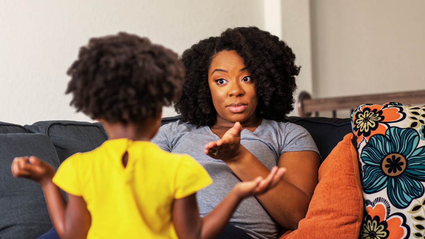 Scientific Ways To Discipline Your Kids That Actually Work Mother redirecting child with other options