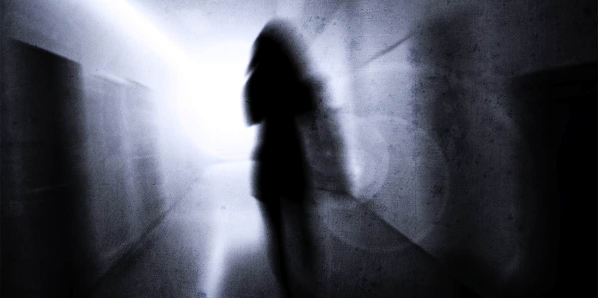 4 Secrets Nobody Tells You About Being Admitted To A Psych Ward woman in hallway