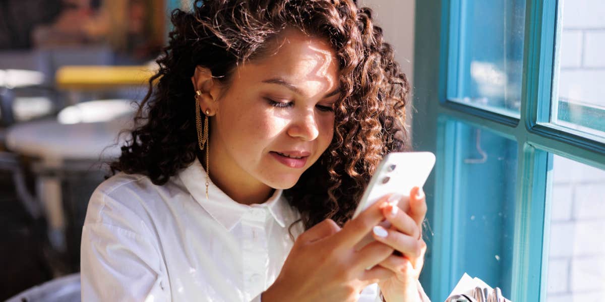 woman using iphone