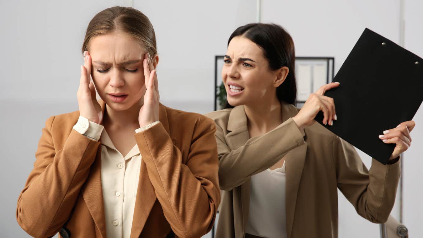 woman feels stressed by toxic boss 