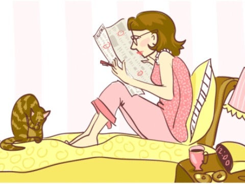 woman reading bed