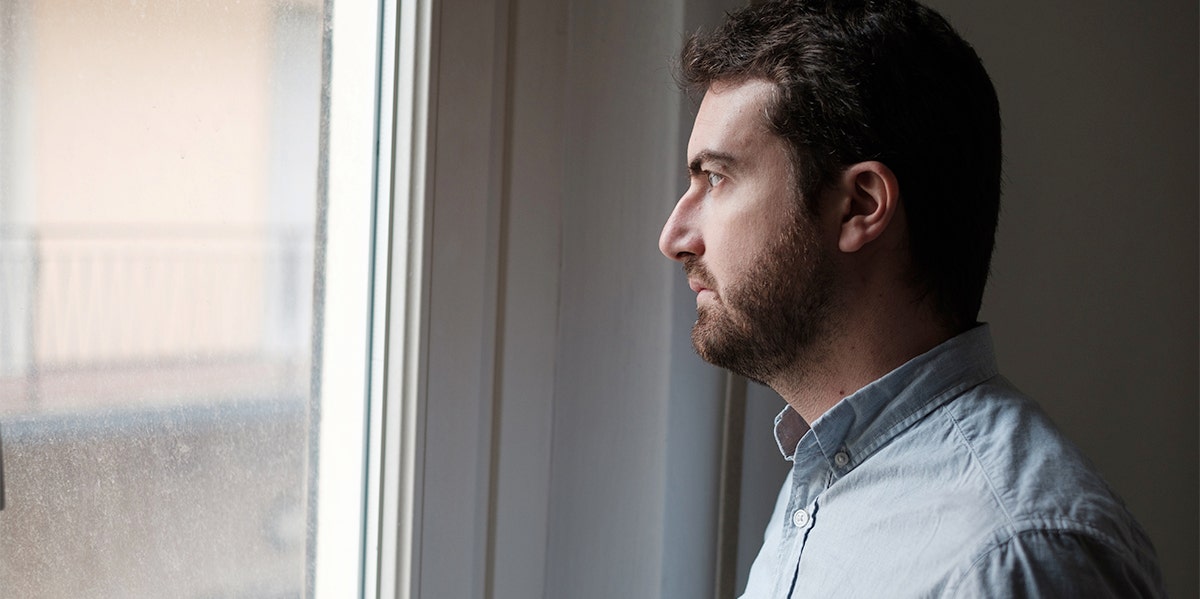 3 Big Reasons Divorce Is More Stressful On Men Than Women sad man looking out window