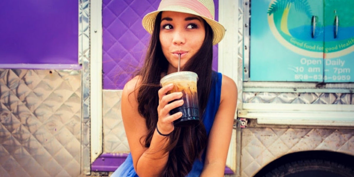 What Is A Gag Reflex? What Men Think About Gagging During Blowjobs Woman sipping suggestively from a straw