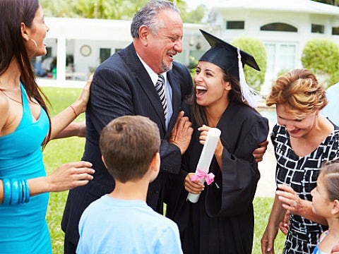 family celebrates woman's graduation