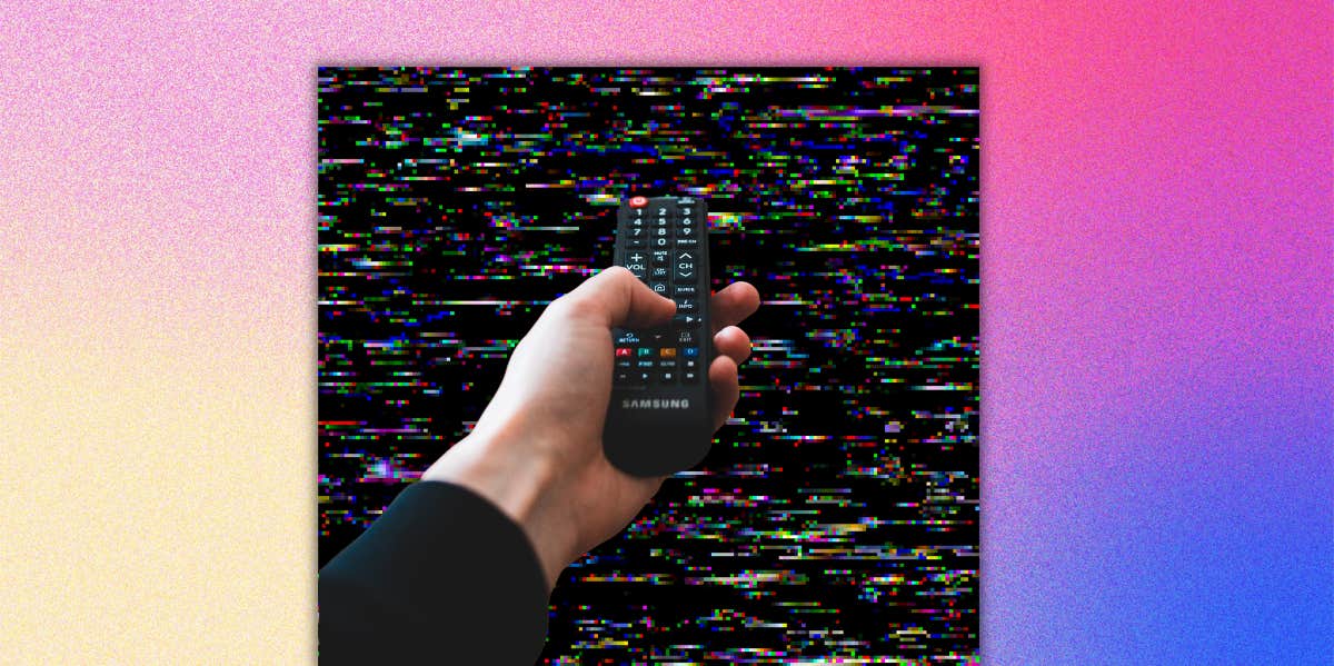 hand holding tv remote