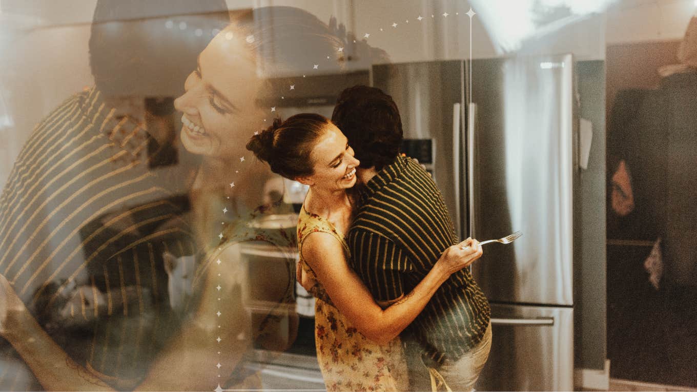 Couple dancing in their kitchen