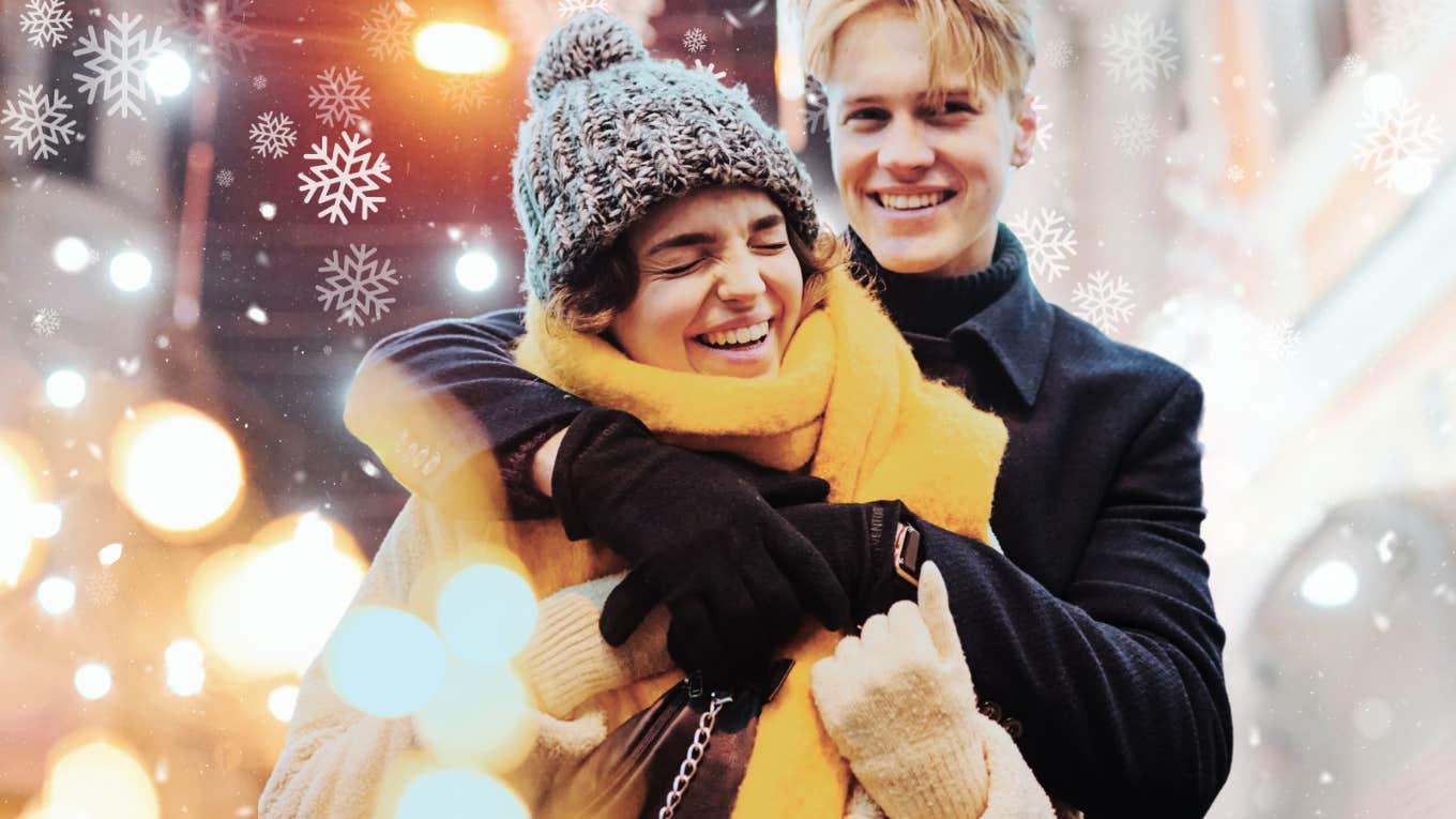 Two people hugging in the snow 