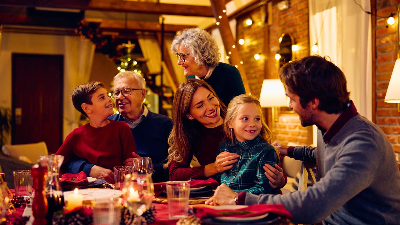 family gathered around table for holiday celebration