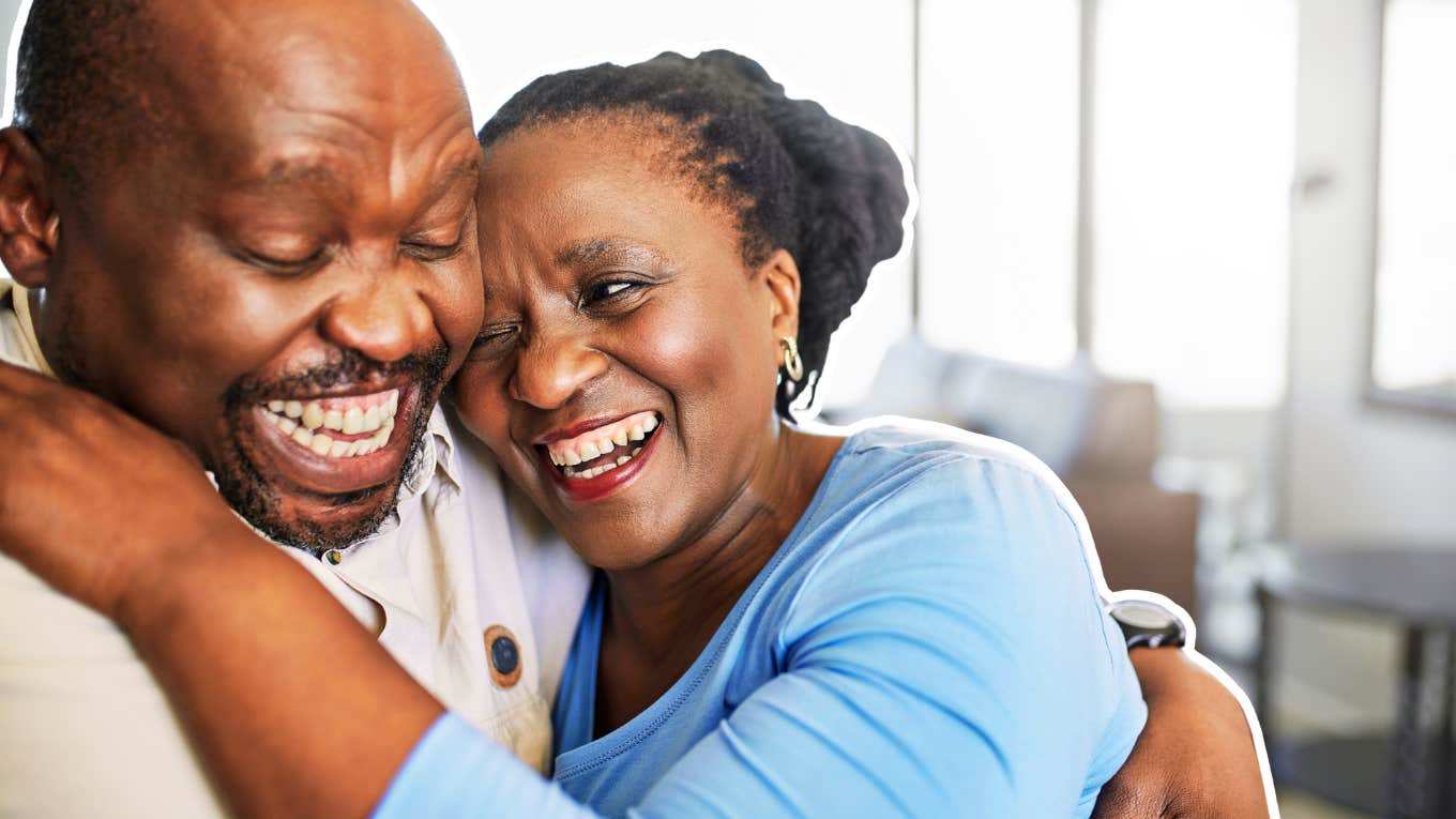 Couple touching each other laughing