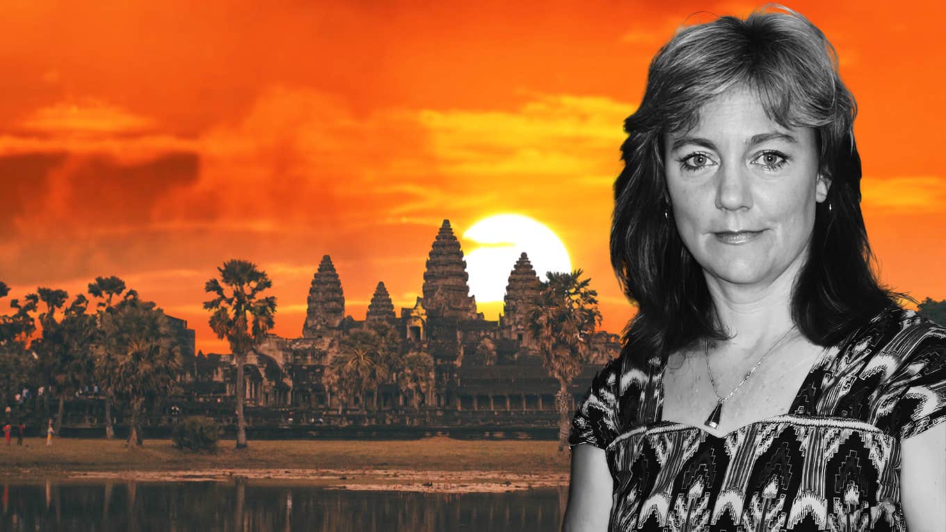 Depiction of Author in Cambodia behind a fire sunset