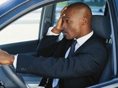 man stressed in the car