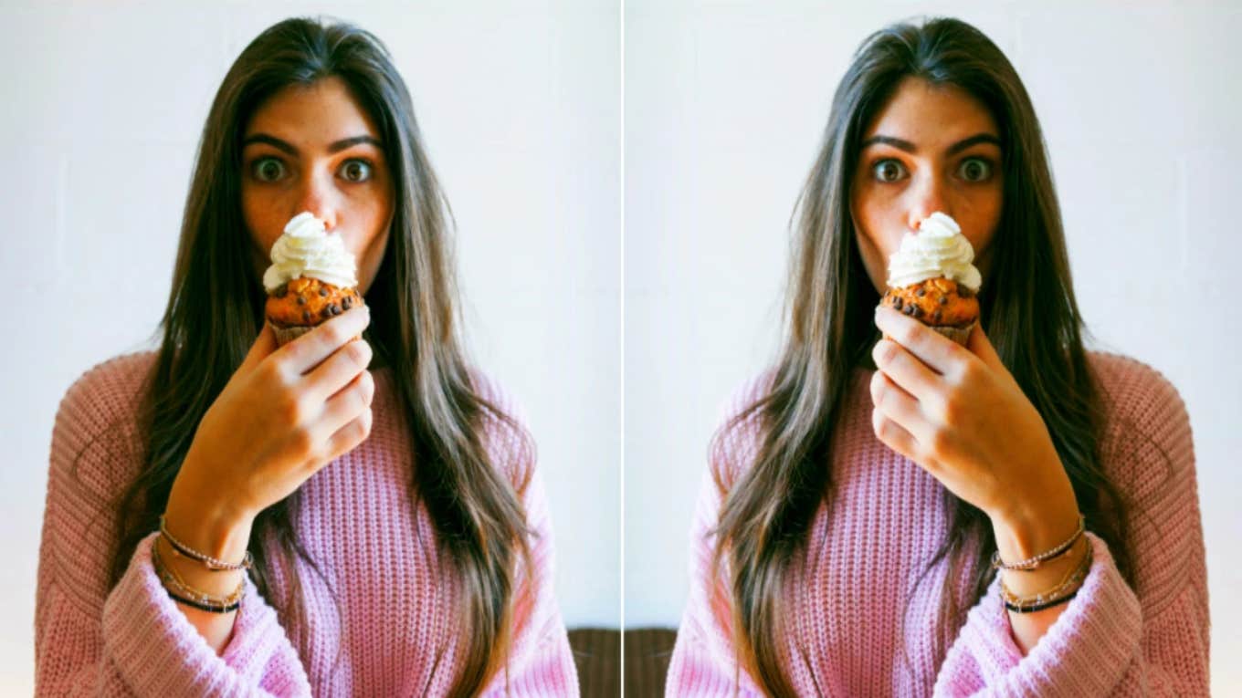 woman eating a cupcake
