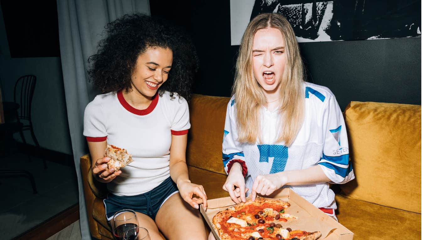 young women eating pizza enjoying rat girl summer