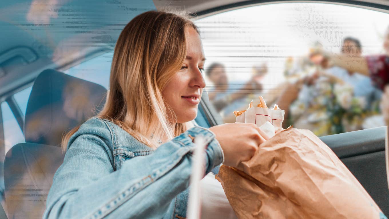 Woman eating in car, as life speed by her. Friends eating together while she's eating alone and on the go