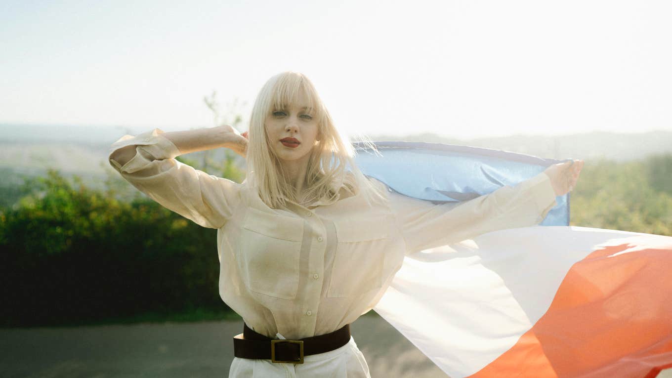 Woman holding the flag of France