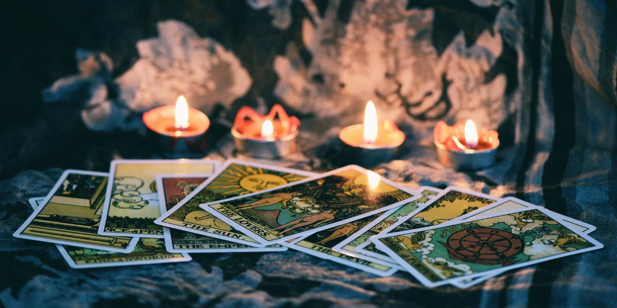tarot cards with candles