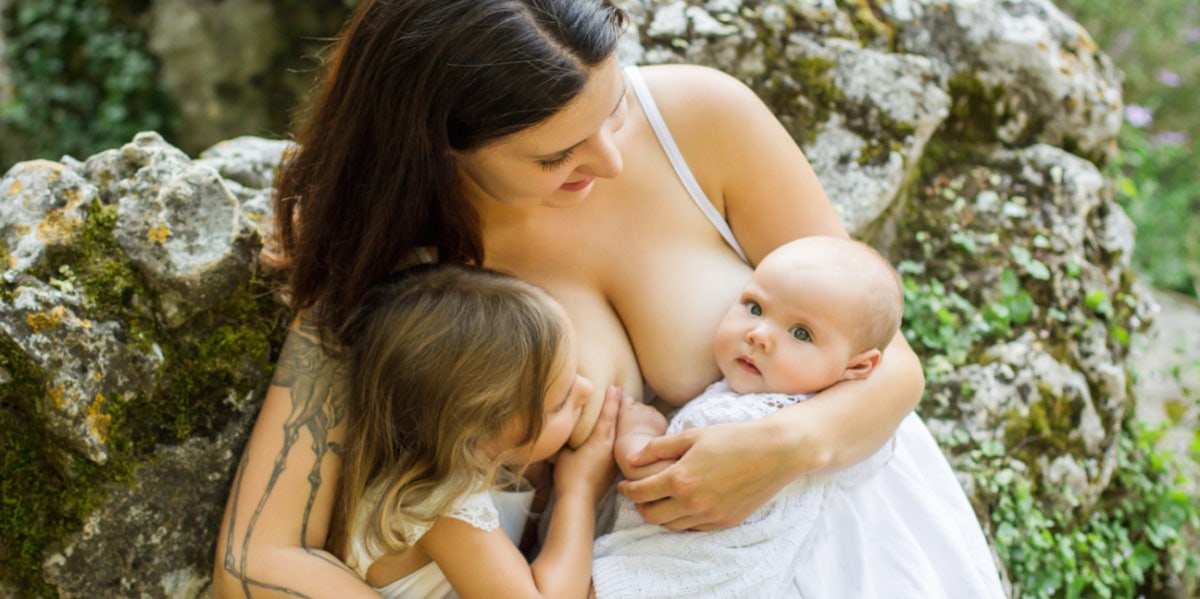 mother breastfeeding children