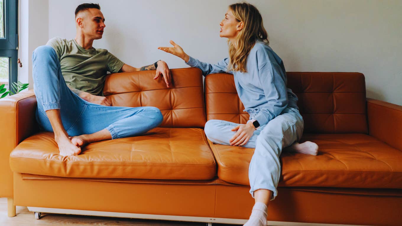 couple arguing on couch