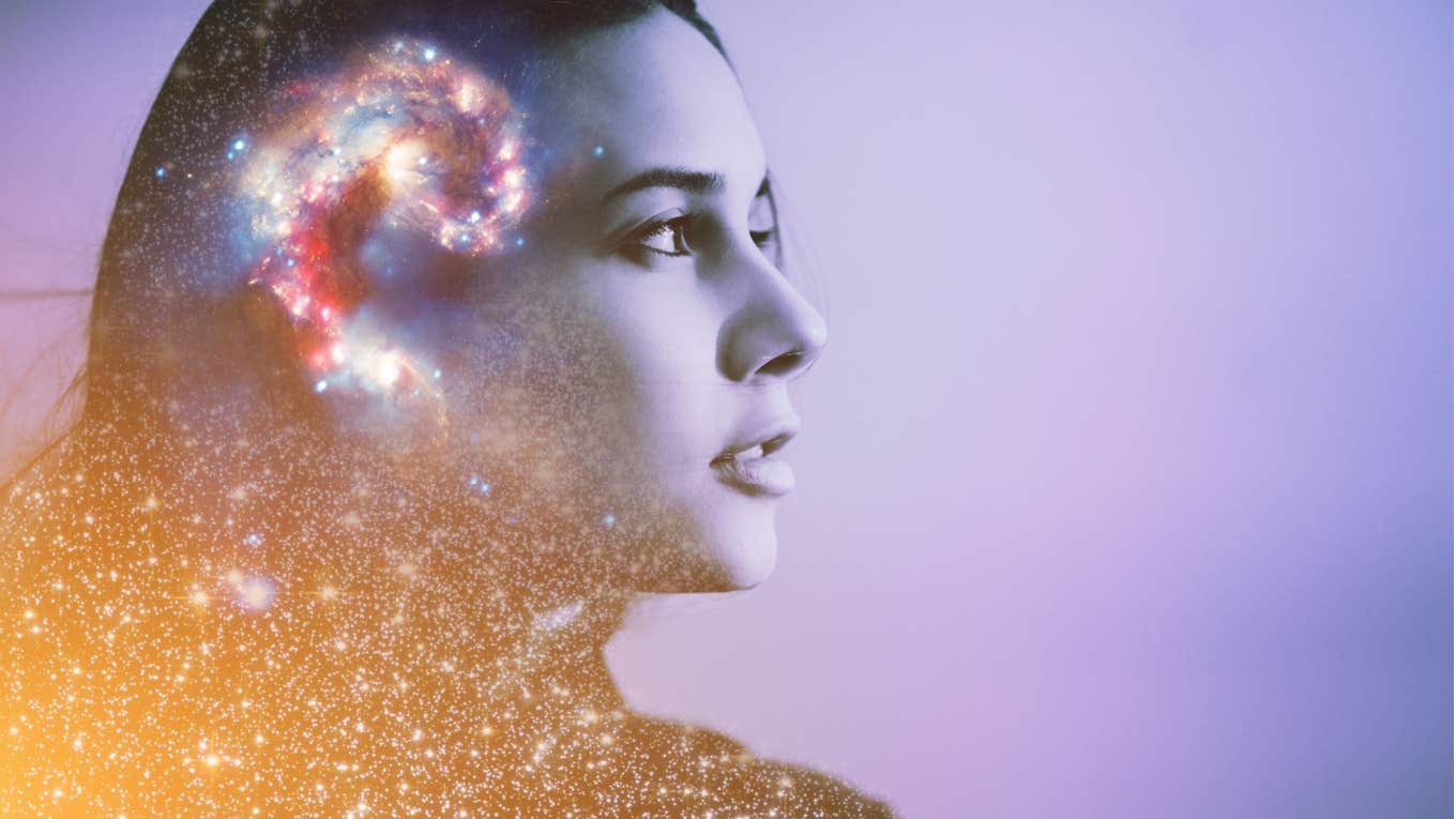 woman connects with the universe