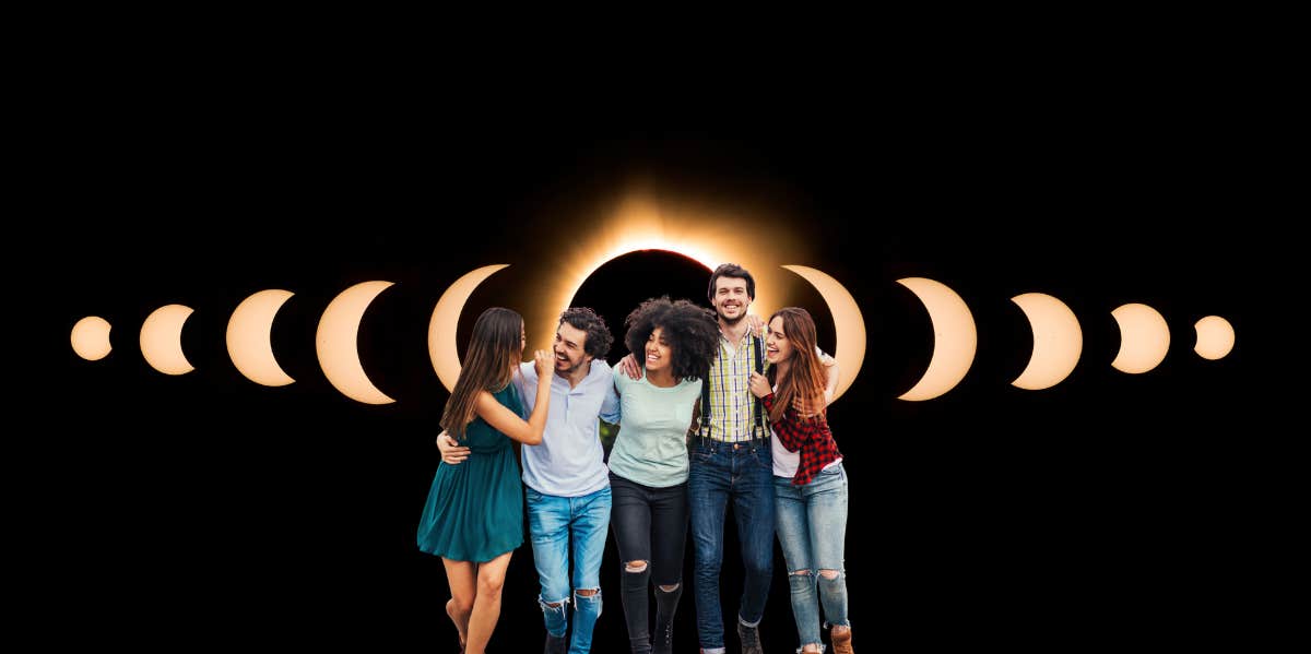 friends walking during an eclipse