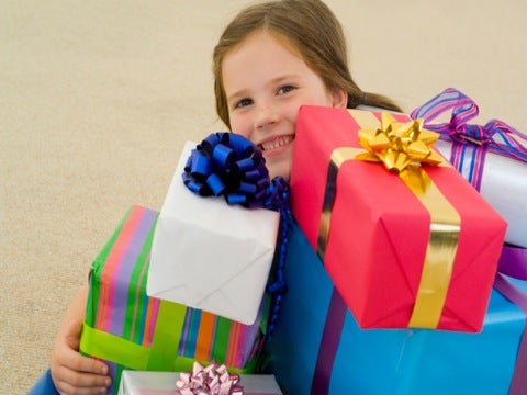 kid with presents