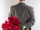 man holding roses