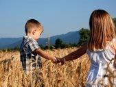 Boy and girl holding hands