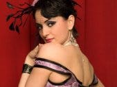 An Unorthodox Way To Get Over A Breakup female dancer in costume looking over shoulder