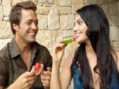 The New Way To Break Up: Be Kind happy couple eating watermelon smiling