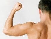 How To Spot A D-Bag From His Online Dating Profile toned man flexing bicep muscle