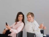 9 Foursquare Relationship Tips man and woman with phones