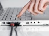 Why You Should Remain Facebook Friends With An Ex woman's hand pressing laptop keyboard