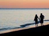 couple holding hands in maui