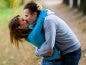 couple kissing outdoors
