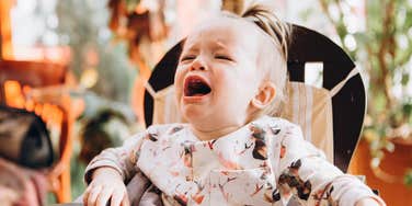 Child crying in restaurant