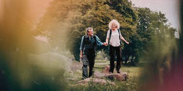 Mature couple hiking, healthy habits to feel great no matter your age 