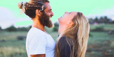 woman laughing with man who is emotionally immature