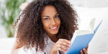 happy woman reading book