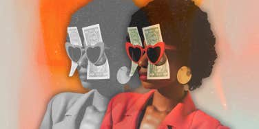 Woman with money in heart shaped glasses